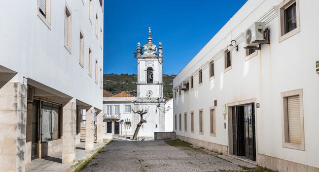 Sesimbra, Portugal - February 19, 2020: Architecture detail of the conservation of civil registers (Conservatoria do Registro Civil) next to the Matriz church of Sesimbra on a winter day