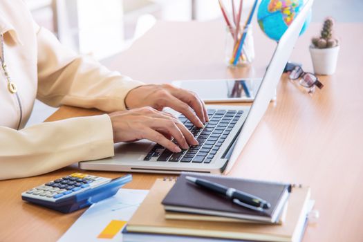 Business woman using laptop computer on the table, Looking for direction and inspiration.