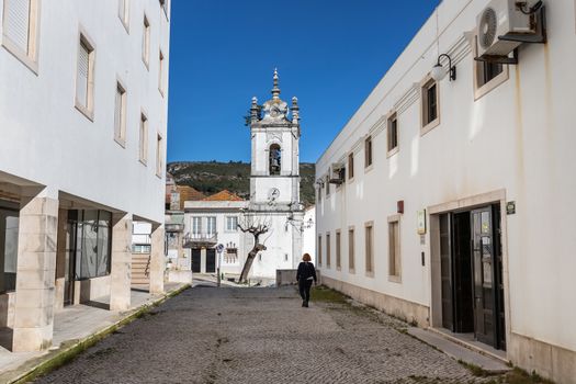 Sesimbra, Portugal - February 19, 2020: Architecture detail of the conservation of civil registers (Conservatoria do Registro Civil) next to the Matriz church of Sesimbra on a winter day