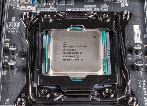 Morgantown, WV - 30 March 2020: Intel Core i9-10920x CPU chip installed in socket 2066 on motherboard