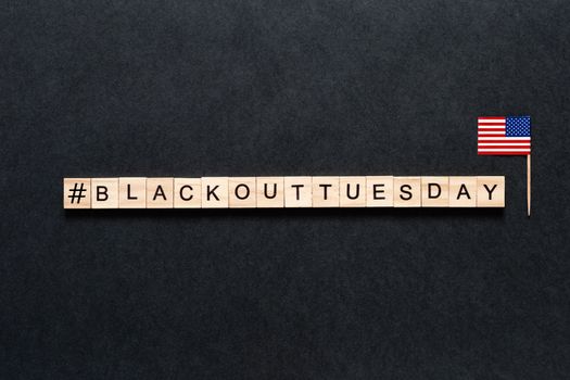 Blackout tuesday inscription on a black background. Black lives matter, blackout tuesday 2020 concept. unrest. rallies. brigandage. looting. marauders. American flag. USA