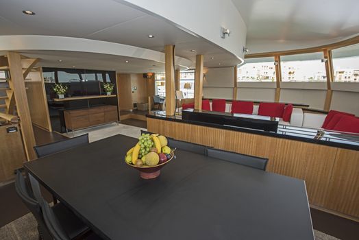Interior design furnishing decor of the salon area in a large luxury motor yacht
