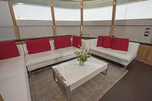 Sofa in salon area of a large luxury motor yacht
