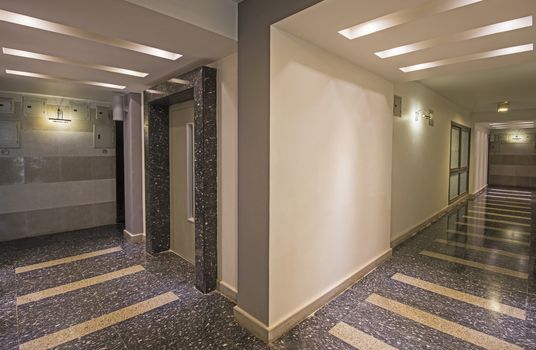 Interior design of a corridor inside a luxury modern apartment building