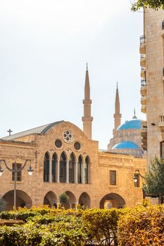 Saint Georges Maronite cathedral and Mohammad Al-Amin Mosque in the background in the center of Beirut, Lebanon