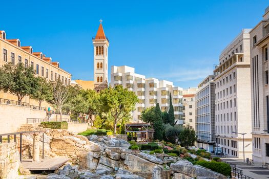 Roman baths ancient ruins site, modern buidings and Saint Louis Cathedral of the Capuchin Fathers Latin Catholic church in the downtown of Beirut, Lebanon