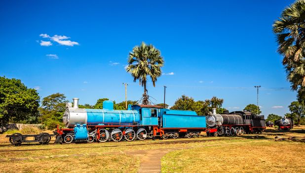 Old retro preserved locomotive trains standing on the railroad in Livingstone, Zambia