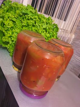 Homemade canned conserve tomato bell pepper harvesting food for the winter