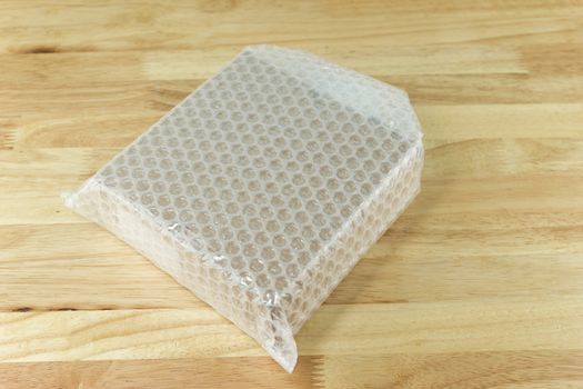 Bubbles covering the box by bubble wrap for protection product cracked  or insurance During transit 