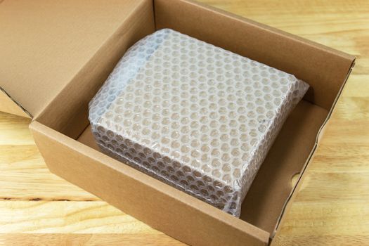 Bubbles covering the box by bubble wrap for protection product cracked  or insurance During transit 