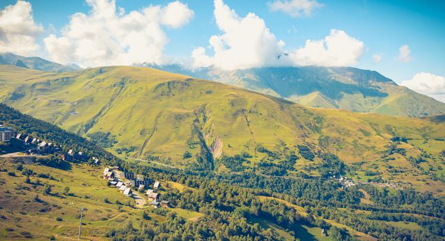 Saint Lary, France - August 20, 2018: Overview of the buildings of the Pla D Adet ski resort on a summer day