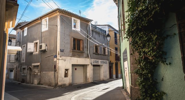 Marseillan, France - December 30, 2018: architectural detail of small typical townhouses in the historic town center of a small fishing port in the south of France on a winter day