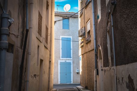 Marseillan, France - December 30, 2018: architectural detail of small typical townhouses in the historic town center of a small fishing port in the south of France on a winter day