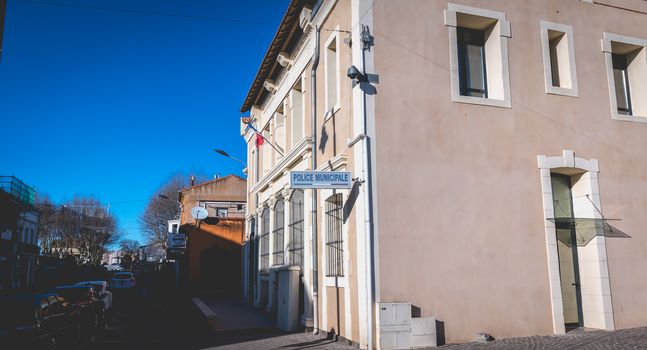 Marseillan, France - December 30, 2018: Architectural detail of the police station in the historic city center on a winter day