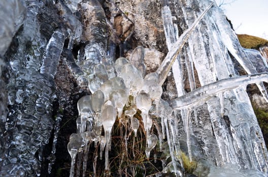 Autumn streams frozen drop by drop in Northern Norway