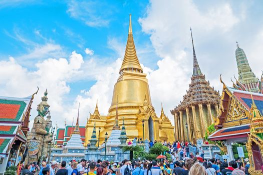 BANGKOK, THAILAND - JAN 9 : Unidentified tourists at Wat Phra Kaew on Jan 9 2016 in Bangkok, Thailand. Wat Phra Kaew is one of the most popular tourists destination in Thailand.