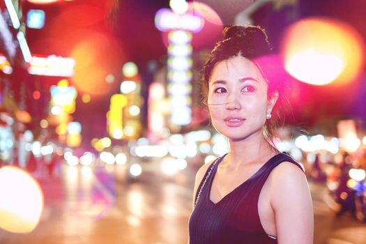 Girl walking on the night city street