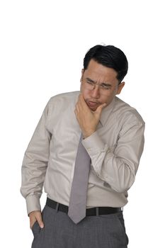 Young businessmen are stressed from toothache. He is in a bad mood. with a white background.