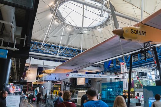 Paris, France - October 6, 2018: Exhibition of the famous Solar Impulse HB-SIA electric aircraft during the Science Fair 2018 in the hall of the City of Science and Industry