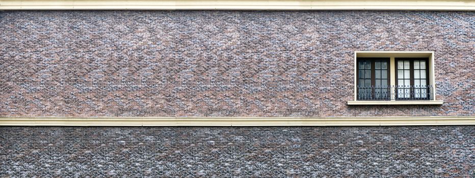 panorama of sand stone brick wall and window