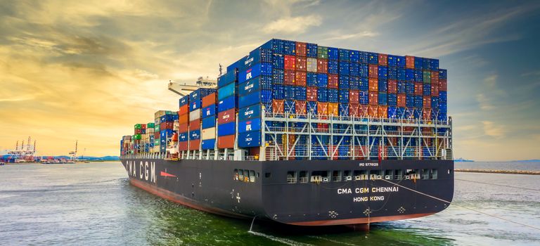 Container cargo ship, Freight shipping maritime vessel, Global business import export commerce trade logistic and transportation oversea worldwide by container cargo ship boat in the open sea.