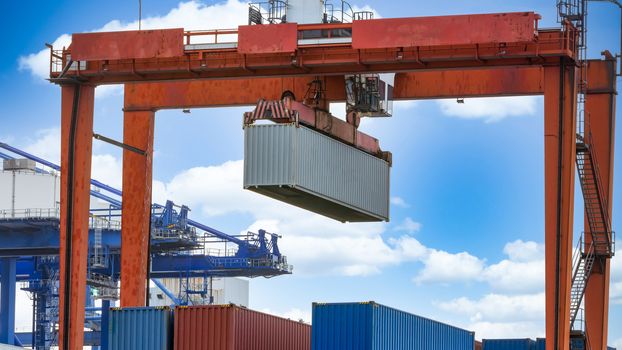 Harbor cargo cranes shipping port equipment, Industrial port crane, Logistics business huge cranes and containers, Cargo freight ship with industrial crane, Container ship in import export business.