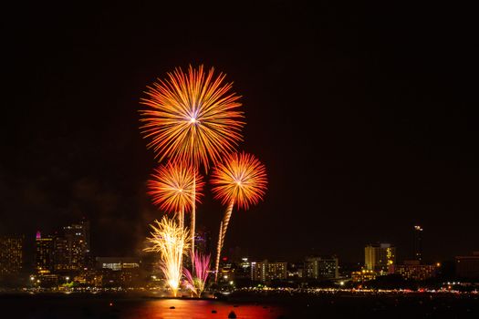 Firework colorful on night city view background for celebration festival.