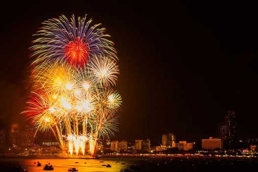 Firework colorful on night city view background for celebration festival.