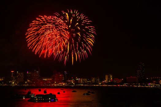 Firework colorful on night city view background for celebration festival.