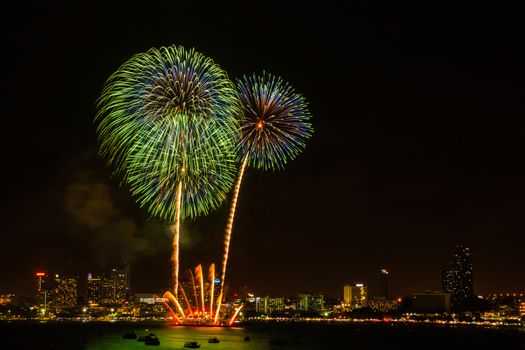 Firework colorful on night city view background for celebration festival.