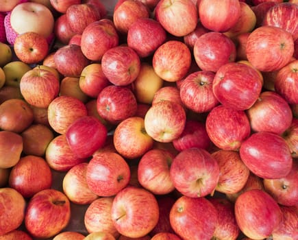 Close up many fresh red apple at market