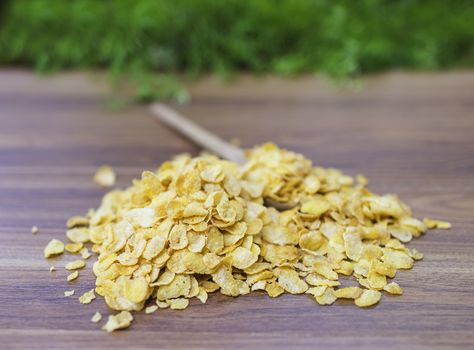 Corn flakes on wood table