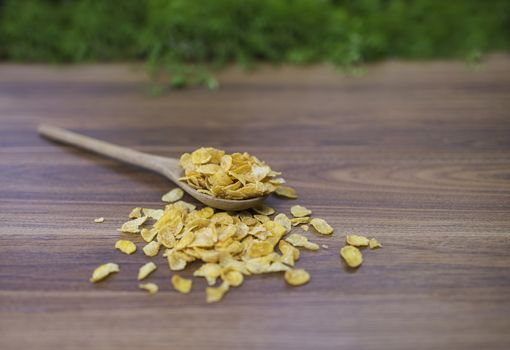 Corn flakes on wood table
