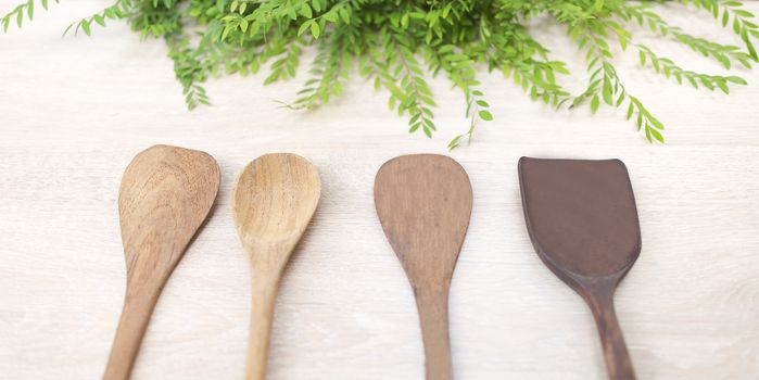 wood spoon wood Turner on white wood background