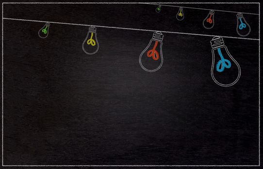 Blackboard, chalkboard texture background and drawing colorful light bulb hanging, party and festival concept 