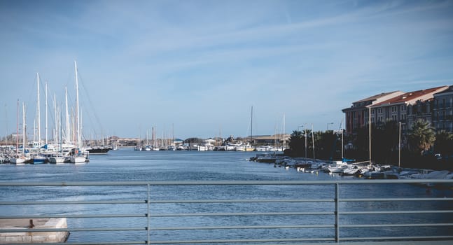 Sete, France - January 4, 2019: view of the marina in the city center where pleasure boats are parked on a winter day