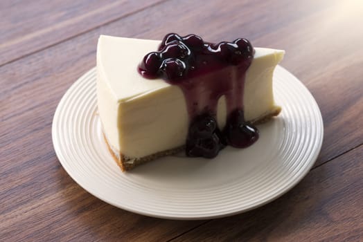 cheesecake, cake, fruit, cream, berry, blueberry, cheese cake, chocolate, closeup, creamy, curls, cut, decoration, delicatessen, delicious, dessert, eat, food, fresh, gourmet, green, leaf, macro, mascarpone, mint, pastry, piece, portion, red, restaurant, sauce, slice, snack, strawberry, sweet, white