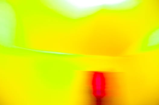 A red, orange and green photographic abstract background