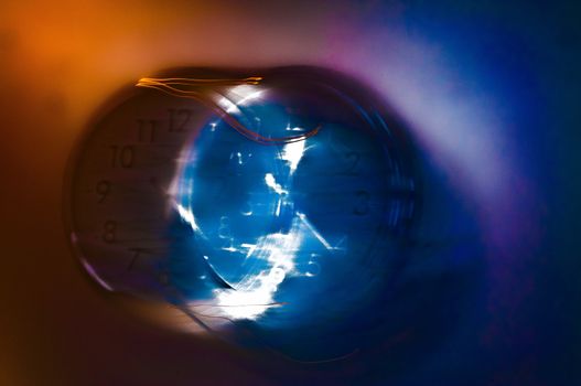 A clock with an effect of movement giving the idea of a new dimension of time