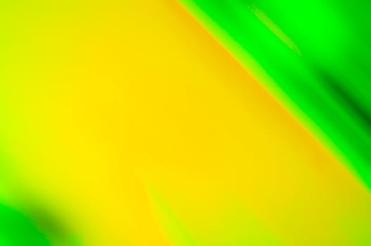 A green and yellow photographic abstract background