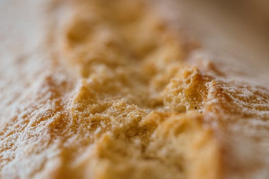 Bread texture, close view from above. Macro photography with shallow depth of field
