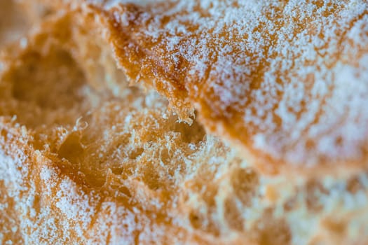 Bread texture, close view from above. Macro photography with shallow depth of field