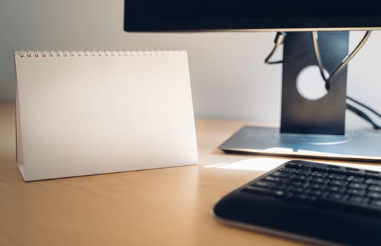 Blank Desktop Calendar or notebook on a office desk.