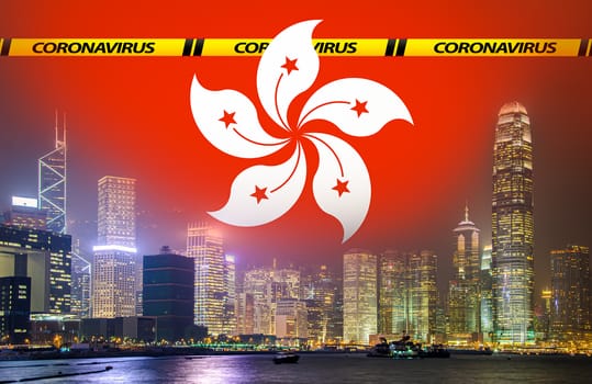 Composite image, Hong Kong skyline at night, Hong kong flag and coronavirus warning sign.Concept of Coronavirus, COVID-19 health emergency spreading around Asia