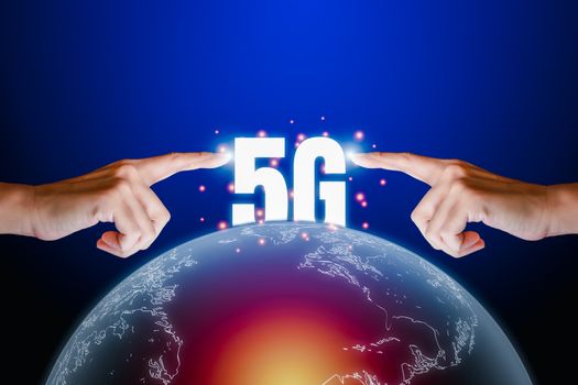 Hight speed internet concept. Human finger point on transparency of the earth and text 5G on blue technology background with copy space. Internet connection and communication around the world.