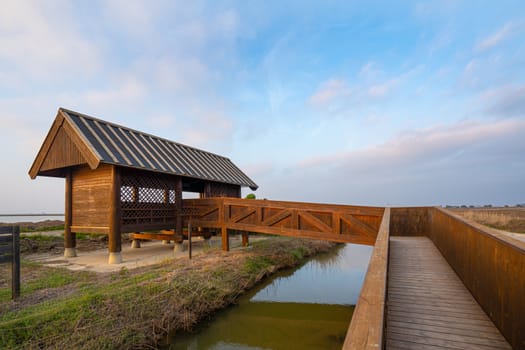 Wooden cabin or bird hut for bird watching in the Ebro river delta, Spain