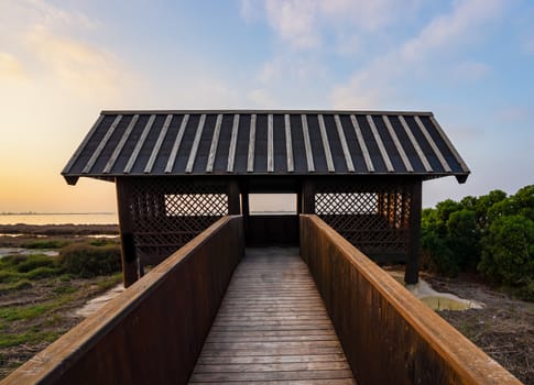 Wooden cabin or bird hut for bird watching in the Ebro river delta, Spain