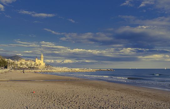 View of the San Sebastian Beach on the mediterranean sea in Sitges, Spain.
