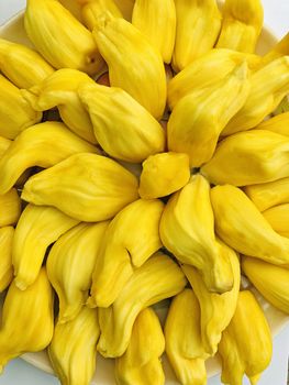 Beautiful view of Jack fruits kept in a plate for sale at market during the summer season