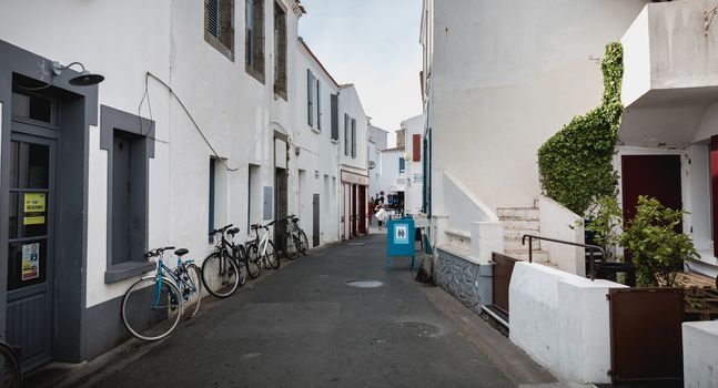 Port Joinville, France - September 16, 2018: typical house architecture detail in a shopping street on the island of Yeu on a summer day